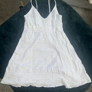 White Mini Dress with Spaghetti Straps and V-Neckline